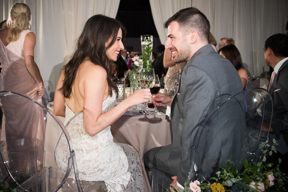 A couple smiling at each other