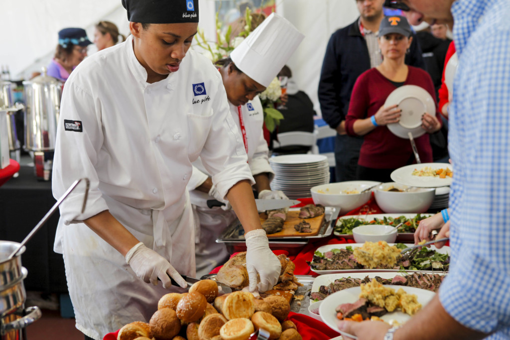 Chef preparing a bountiful buffet at the Chicago Marathon